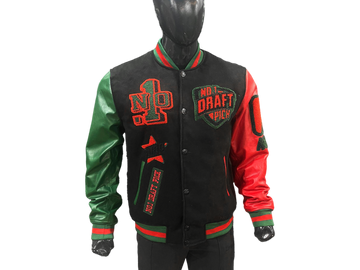 Unisex varsity jacket featuring a black wool body with red-green detailing, lambskin leather sleeves, and historic-themed embroidery in a premium streetwear style