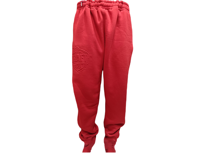 Unisex red jogger pants with tonal embossed logo, tapered fit, ribbed cuffs, and drawstring waist for casual streetwear style